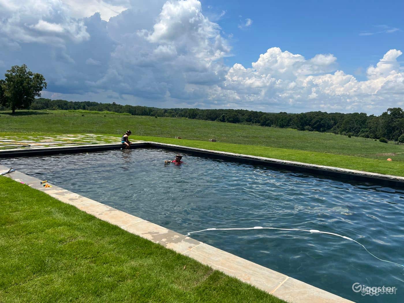 Rectangular Pool Retreat on 80 Acres Estate Photo 1