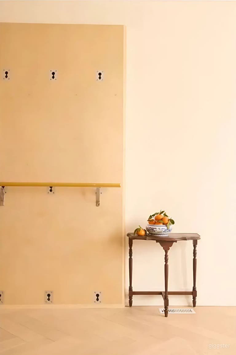  Elegant Victorian Setting with Warm Wood and Natural Light 