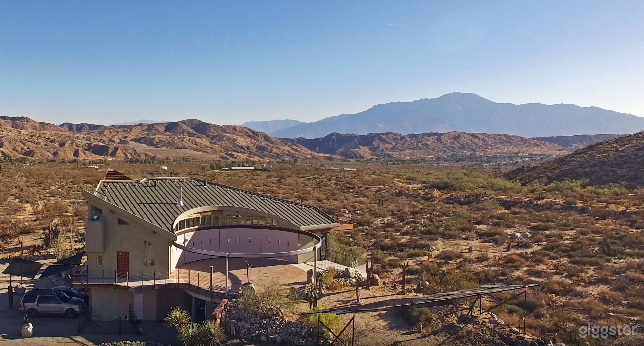Birds eye view of the back of the house showing the acreage around the property