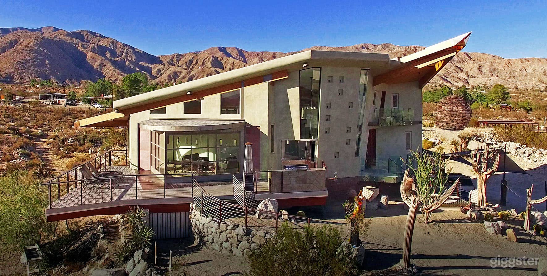 Photos shows living room rotating outdoors.