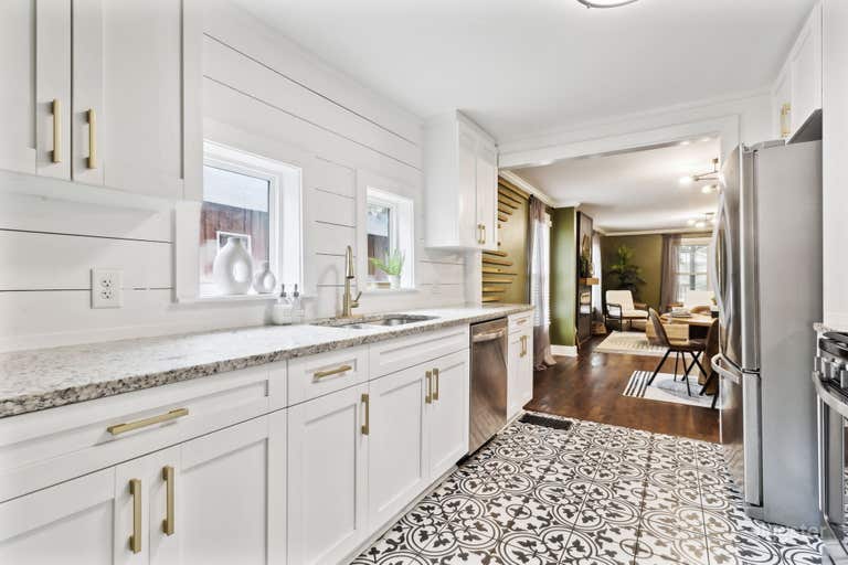  Designer home w/ large yard, porch, deck, & patio 