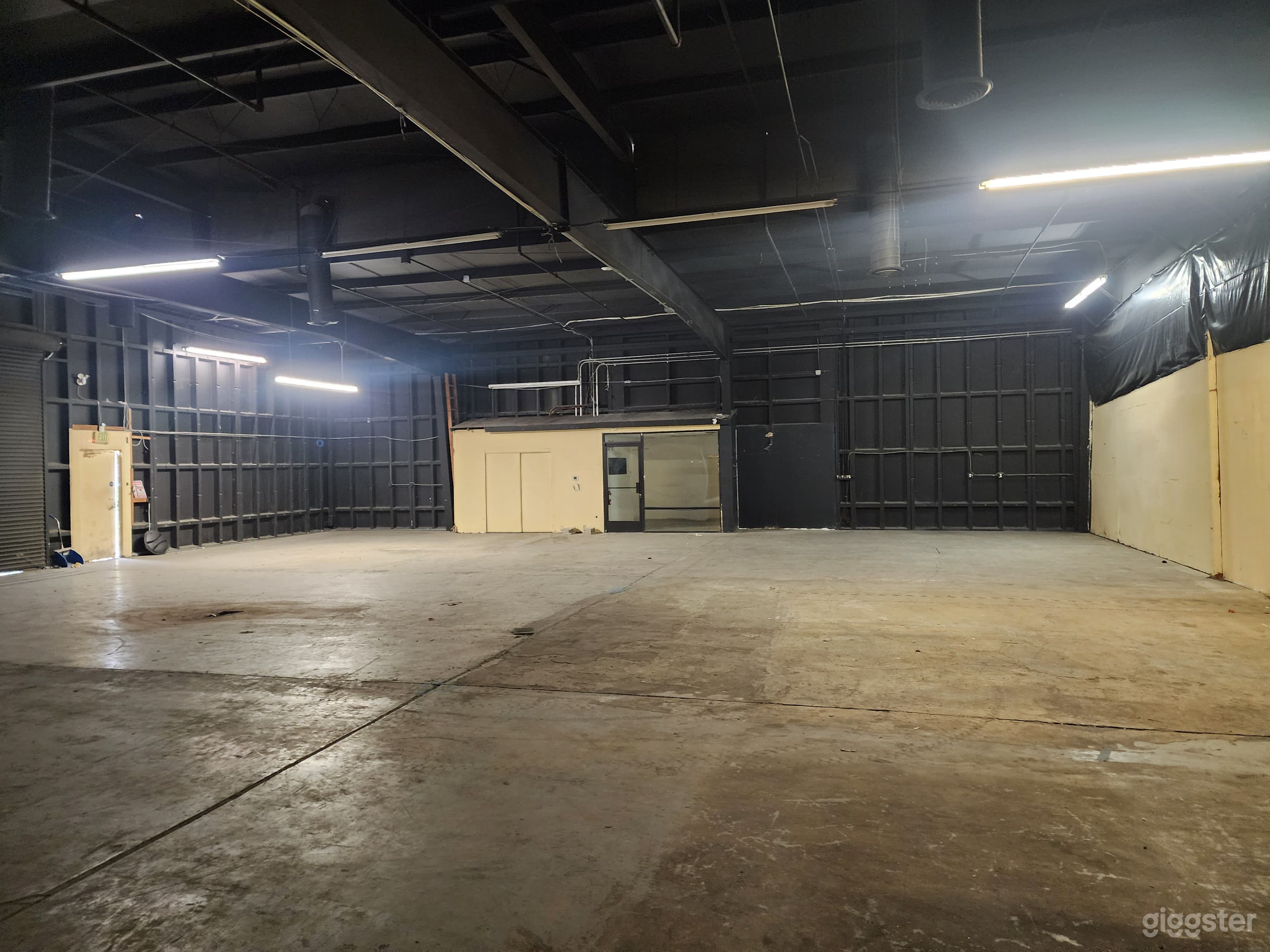 Large warehouse space with lots of props Photo 1