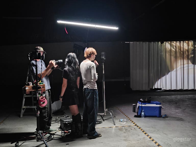  Large warehouse with lots of sets and props 