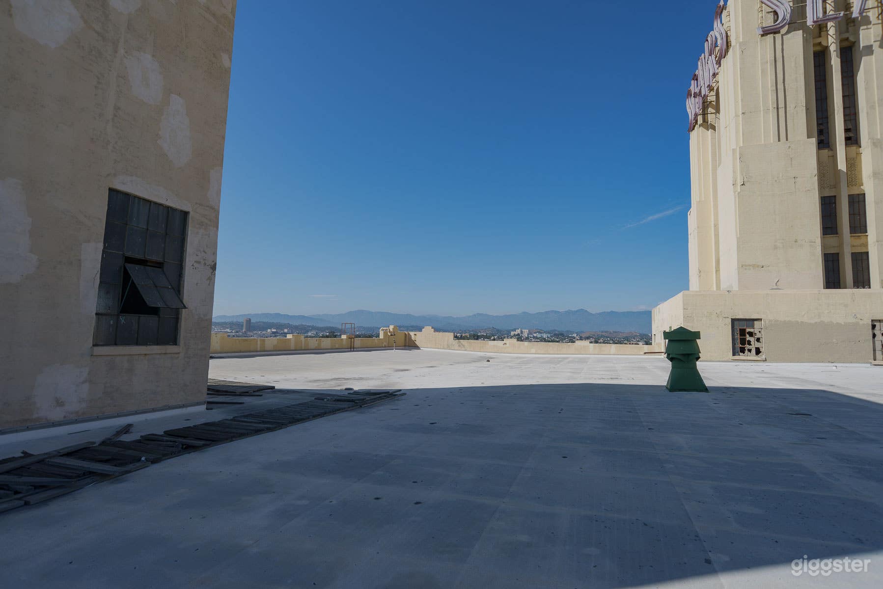 Raw Rooftop with Gorgeous View Photo 2