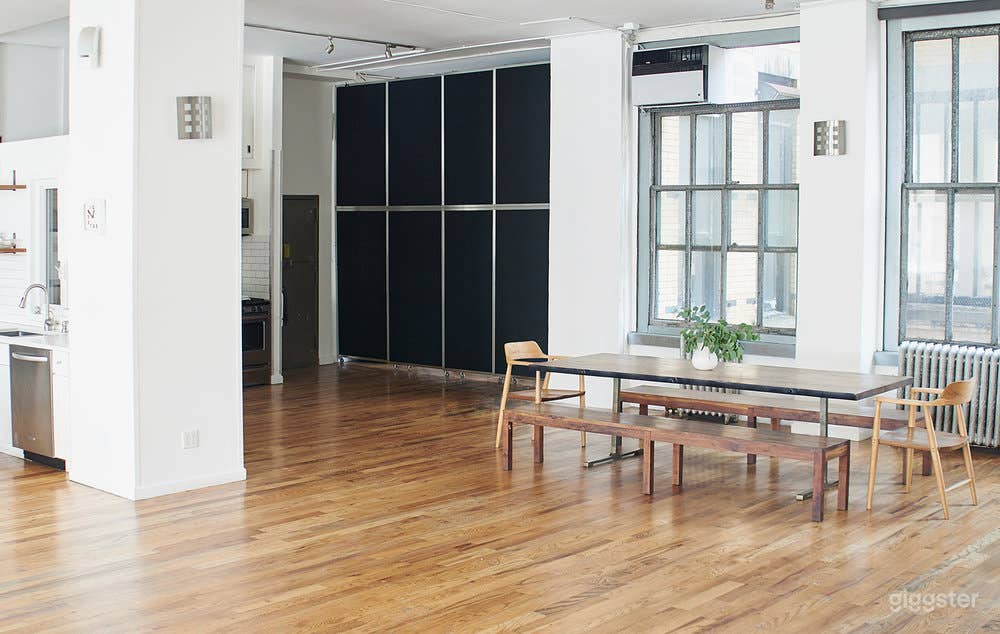 Modern White Brick Kitchen Loft w/ Living &amp; Dining Area Photo 2