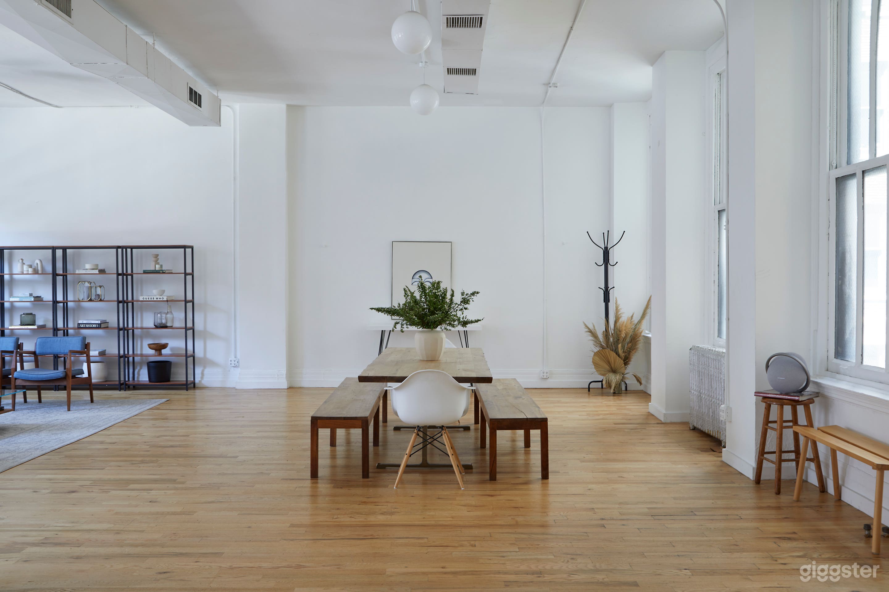 Modern White Brick Kitchen Loft w/ Living & Dining Area Photo 2