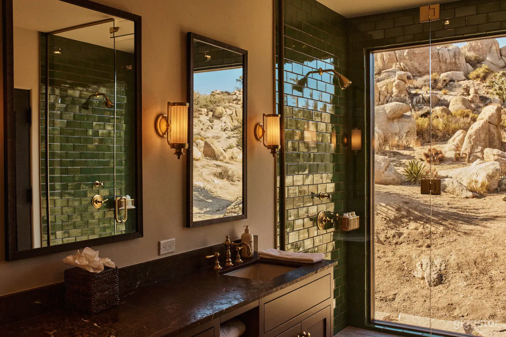 Master bathroom with floor to ceiling shower window, two shower heads, two vanities. 
