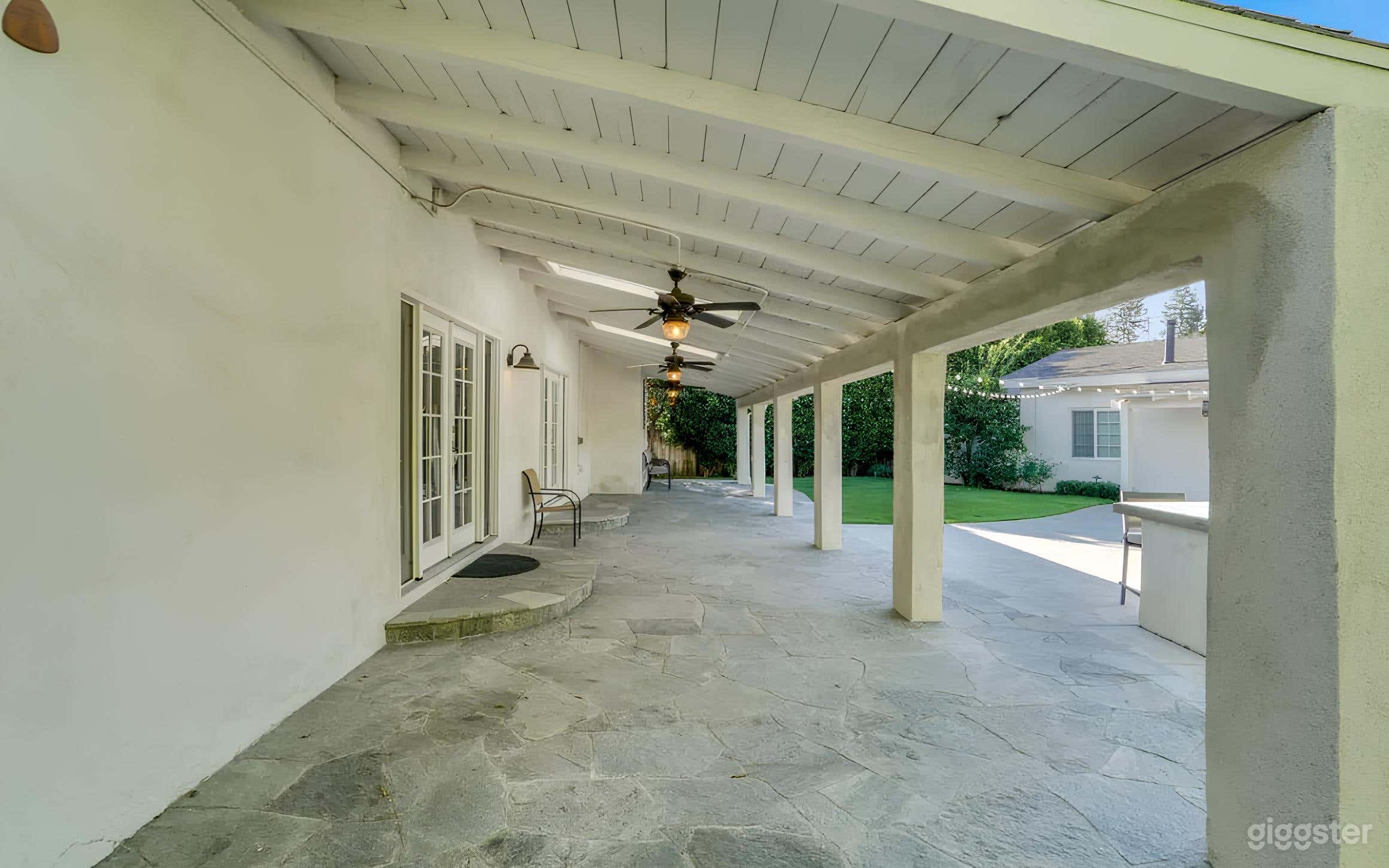 Backyard Resort-Style Setting with a Pool Photo 4