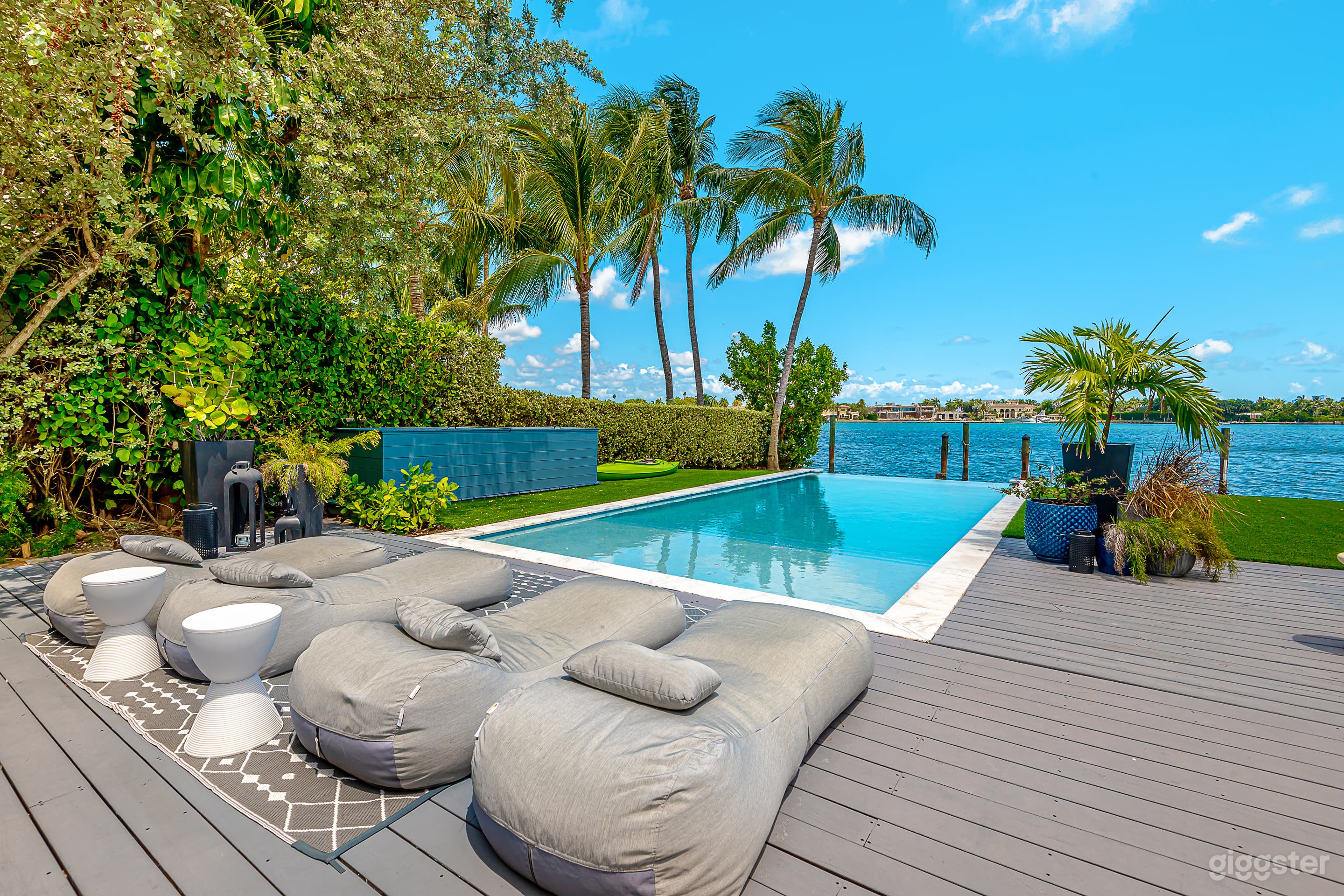 Outdoor Patio Deck / Pool / Lounge area / Dining set for 8 / Open recreational area with artificial turf 