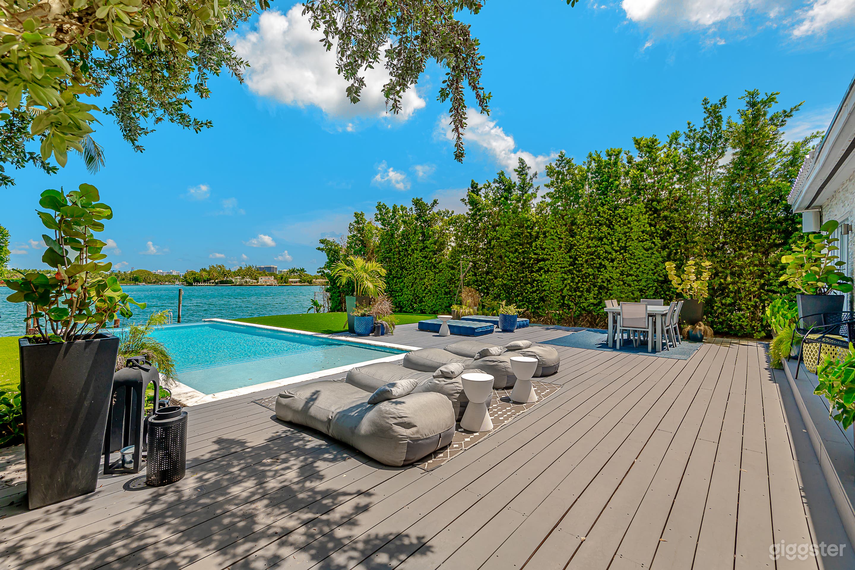 Outdoor Patio Deck / Pool / Lounge area / Dining set for 8 / Open recreational area with artificial turf 