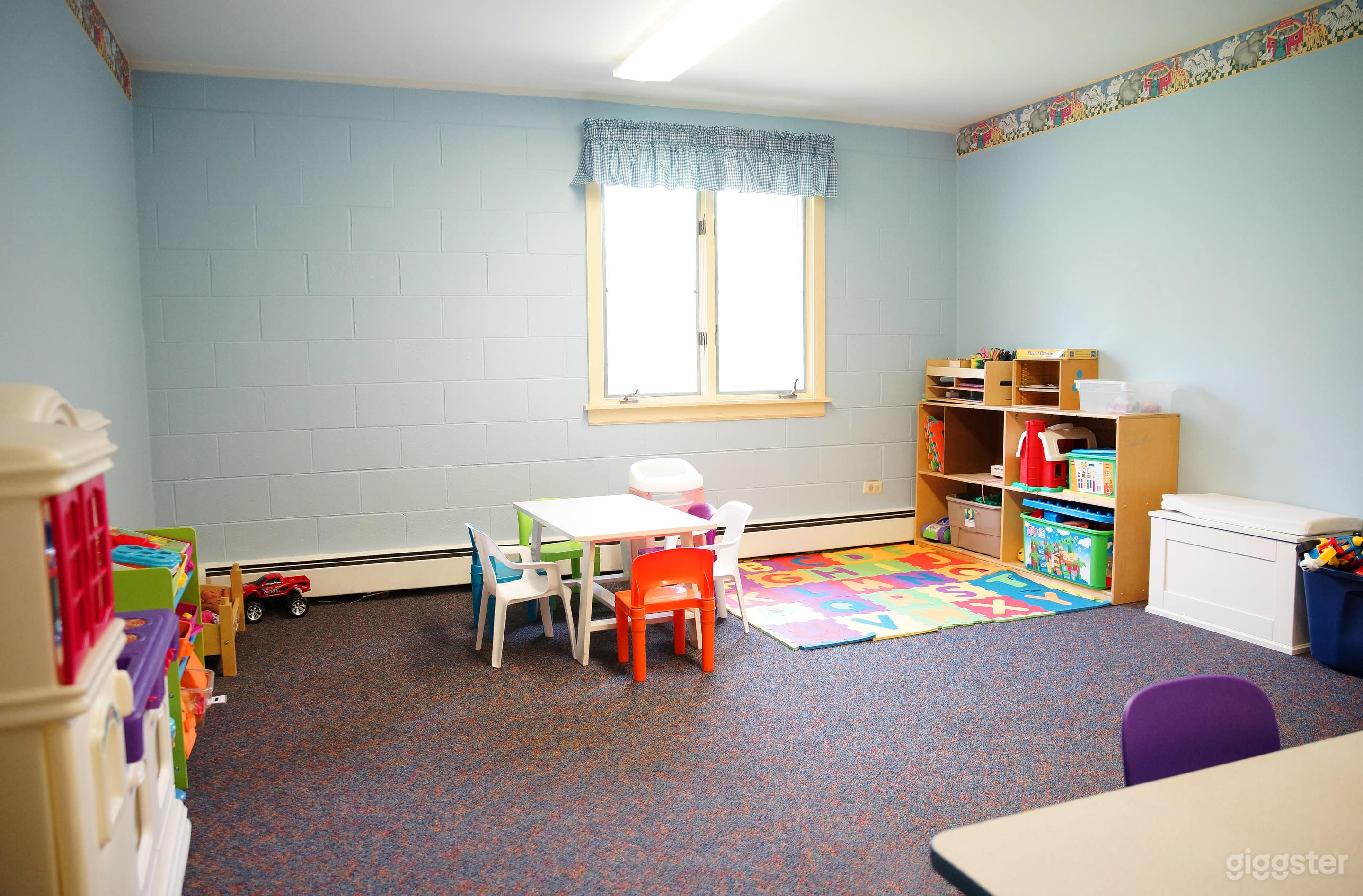 The room is adjacent to our nursery for those time when a group needs a second space for little people