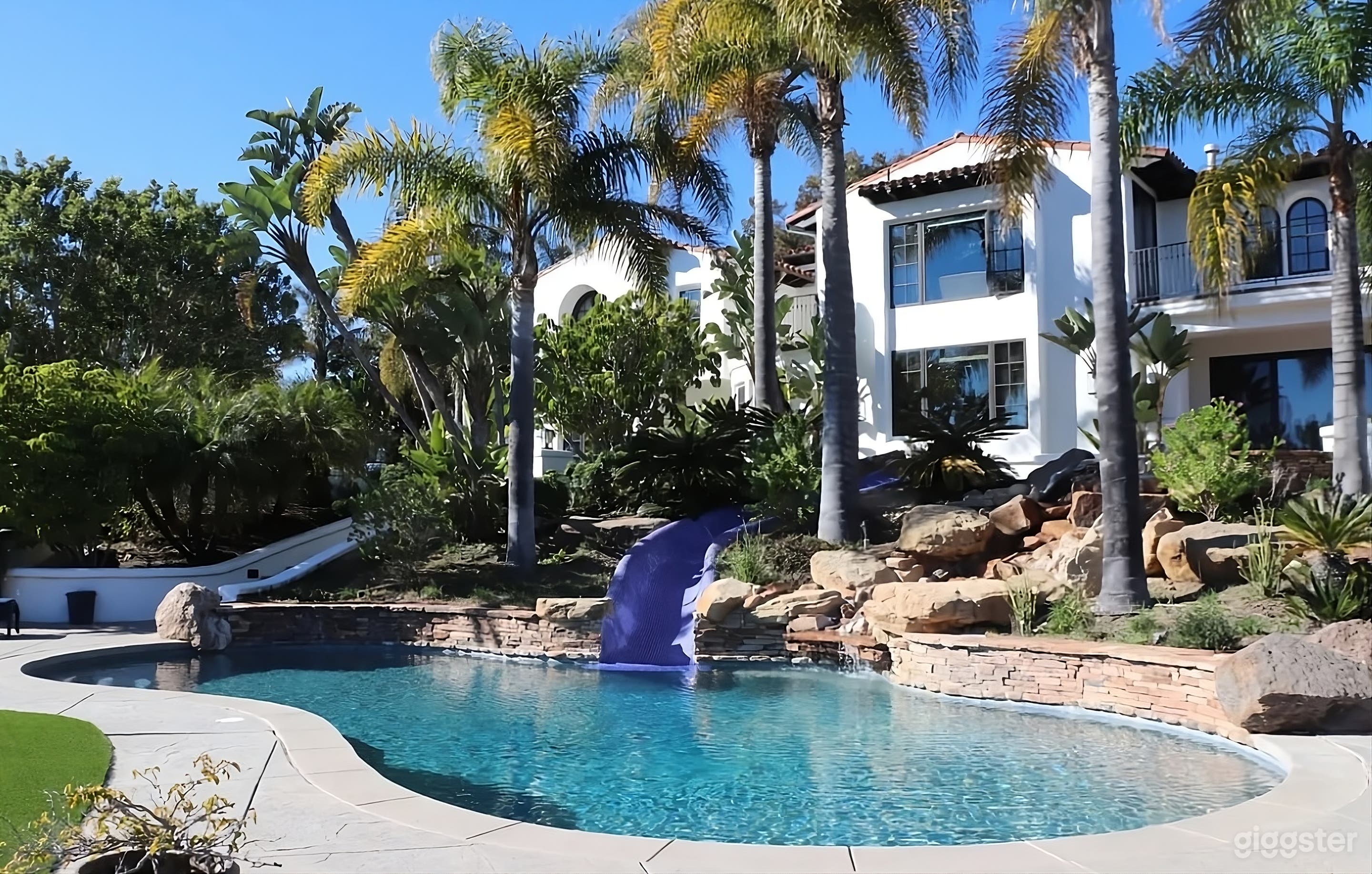 Mediterranean Style Estate Backyard with Pool Photo 2