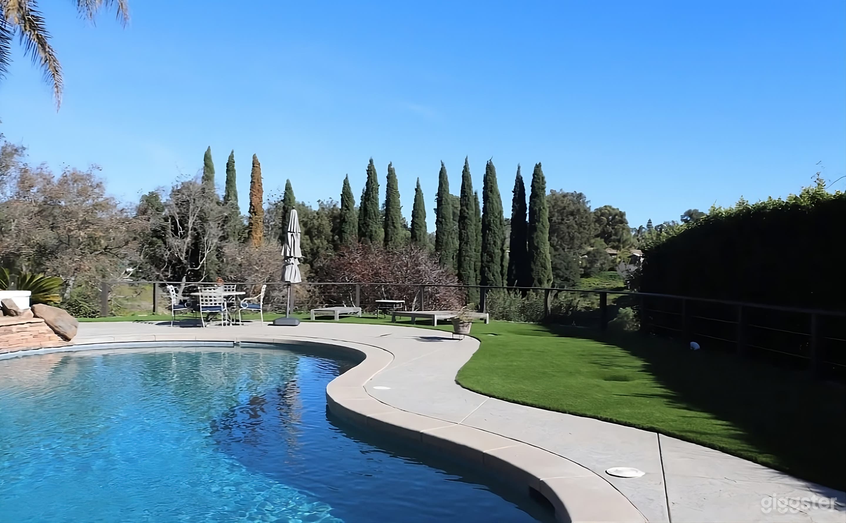 Mediterranean Style Estate Backyard with Pool Photo 1