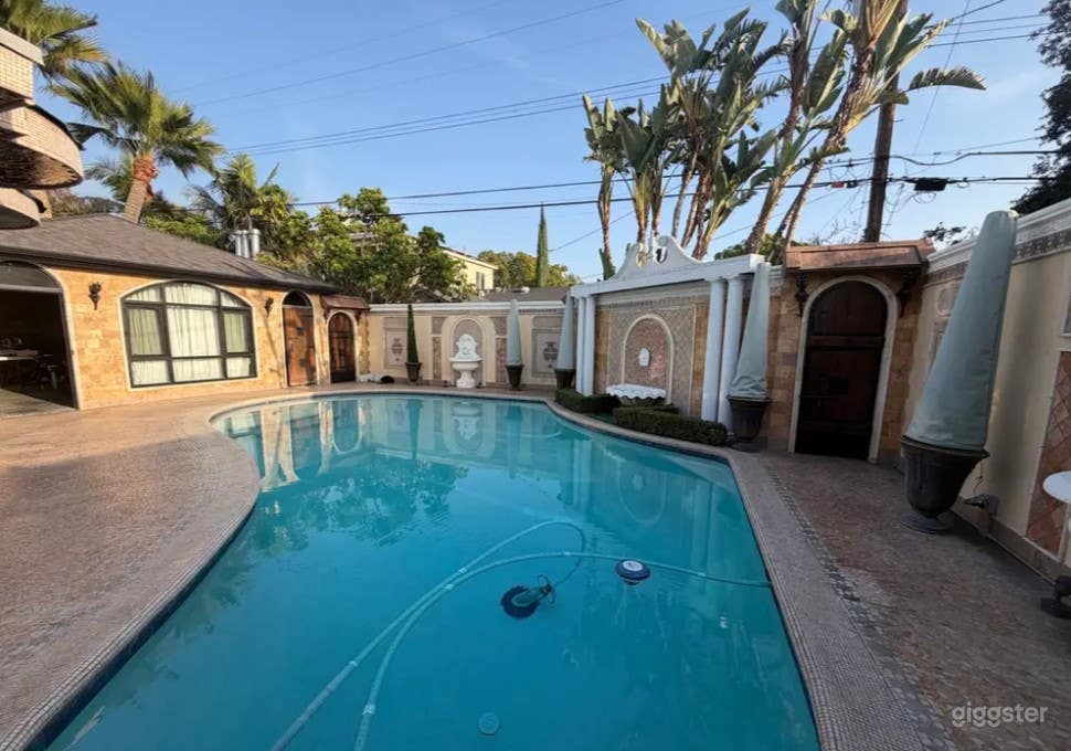 Show Stopping Centerpiece Pool Area Photo 3