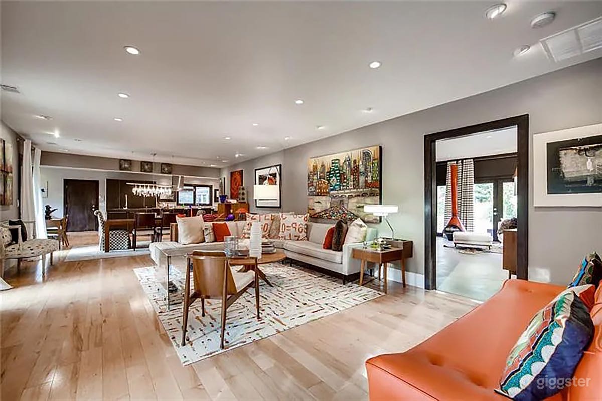 2000 sqft open plan Living Room that connects seamlessly to Kitchen.  Large picture window in Foyer. Floor to ceiling windows that open out to front patio. 