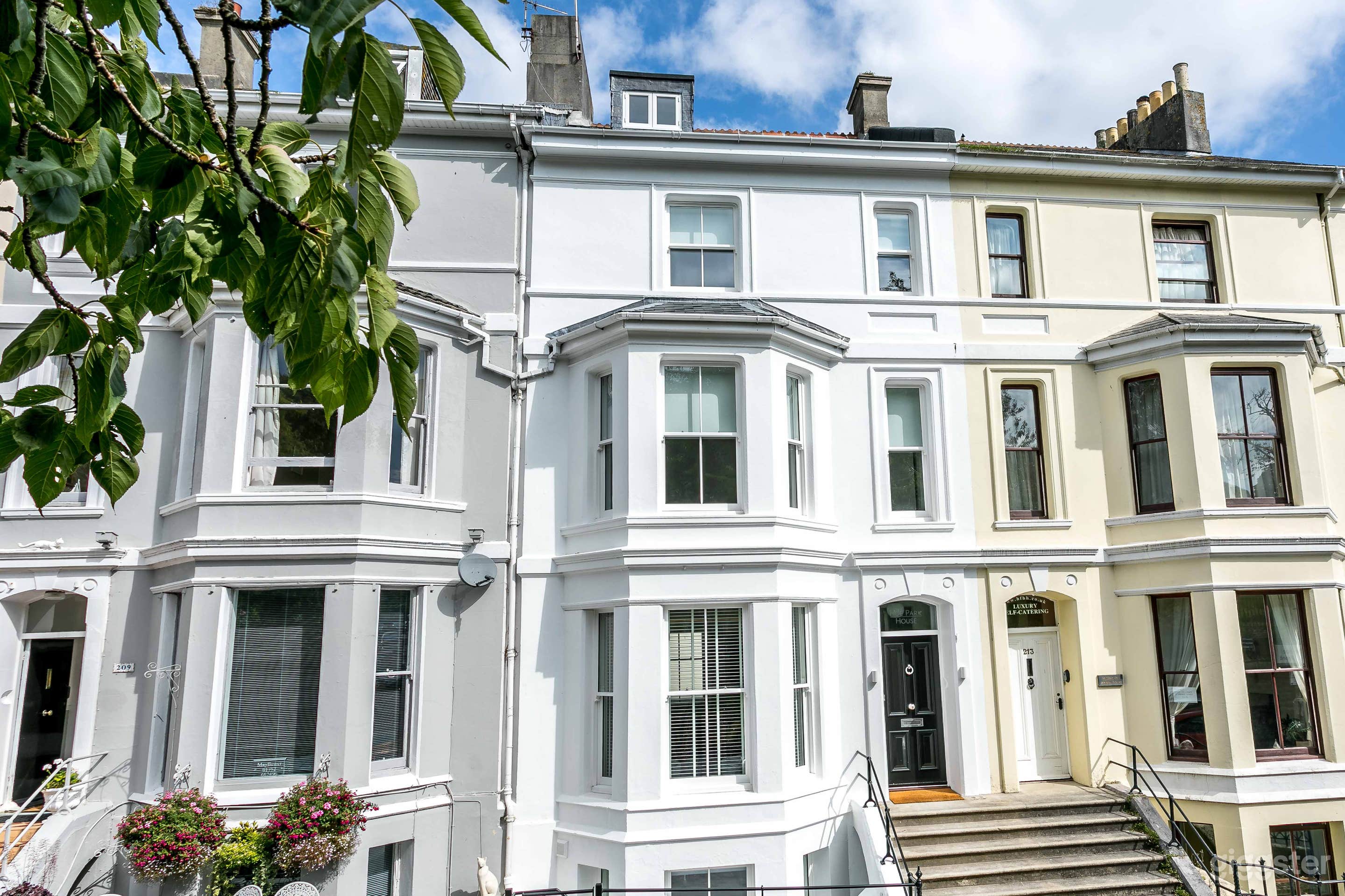 Hoe Park House viewed from the park, just across the street. Situated in a quiet cut-de-sac, made up of seven Victorian townhouses.