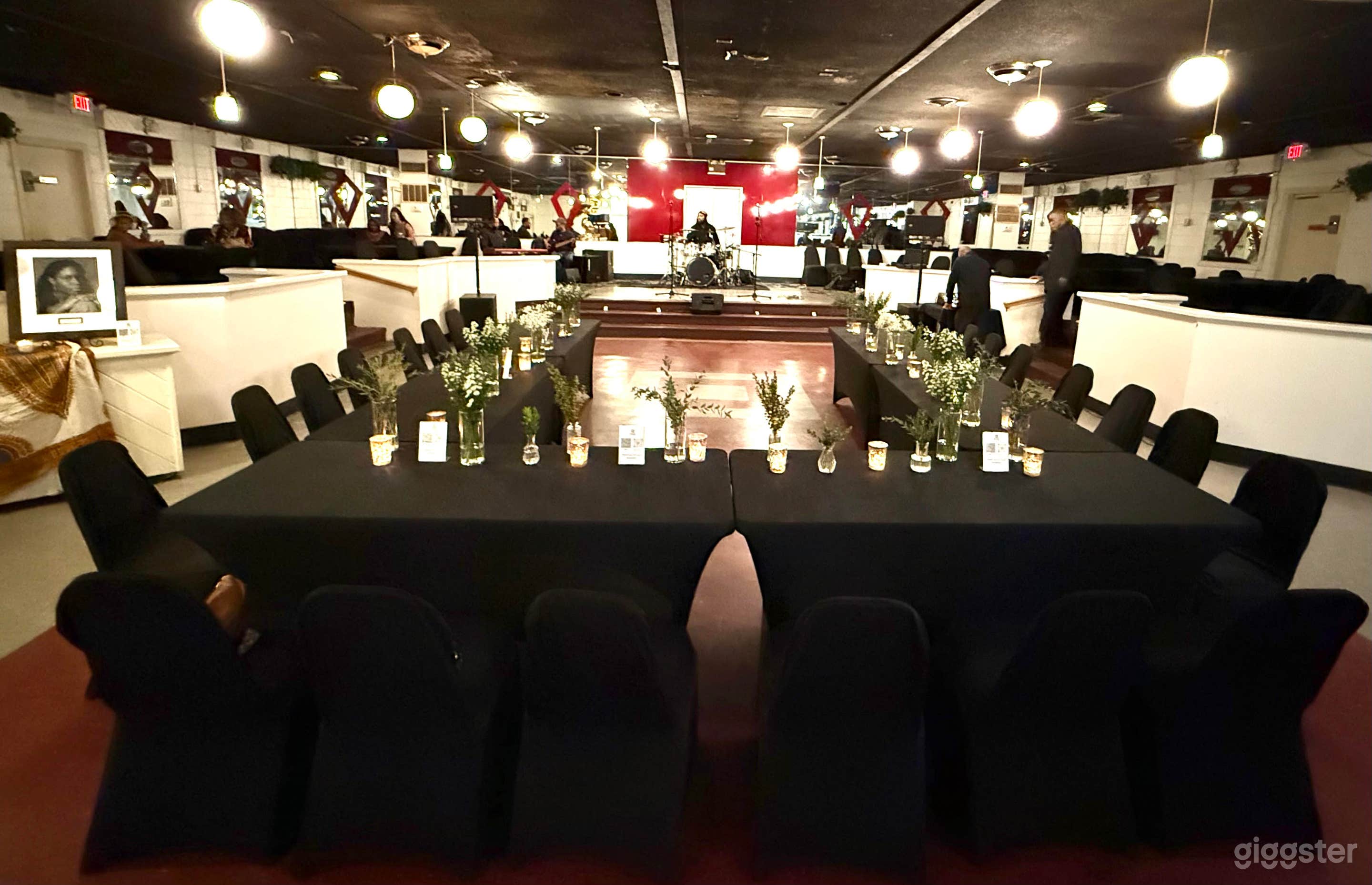 Spacious indoor venue with picturesque outdoor amenities Photo 1