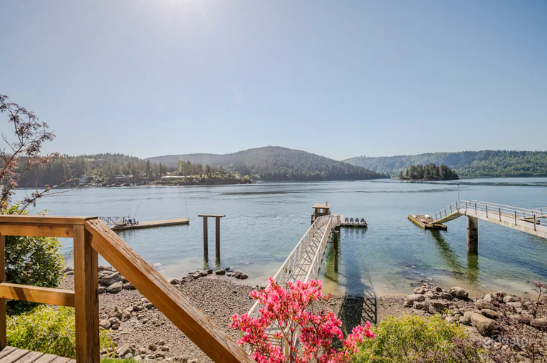  Waterfront home with private dock, studio, & views 