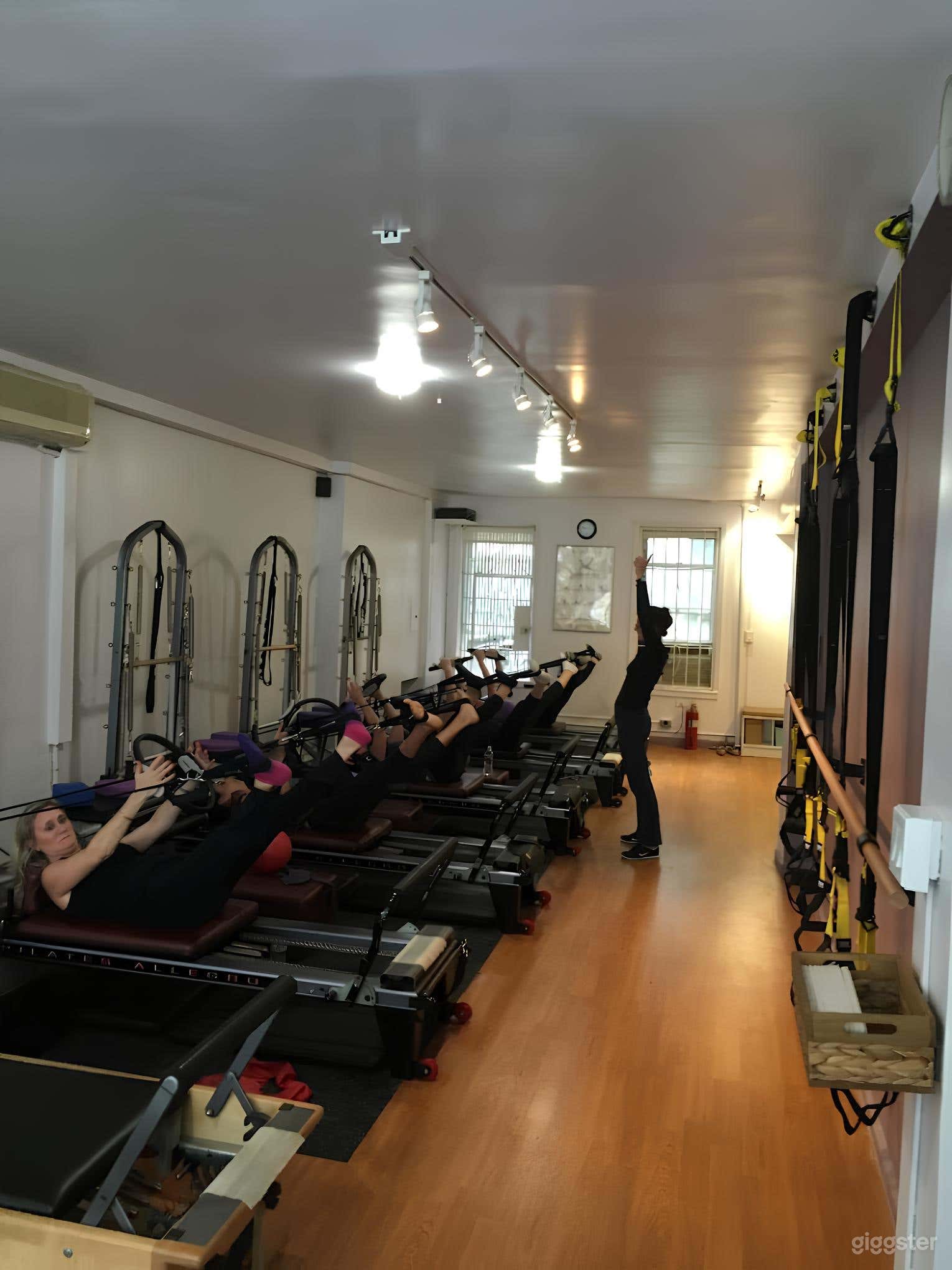 Contemporary Pilates Studio with Brick Walls Photo 4