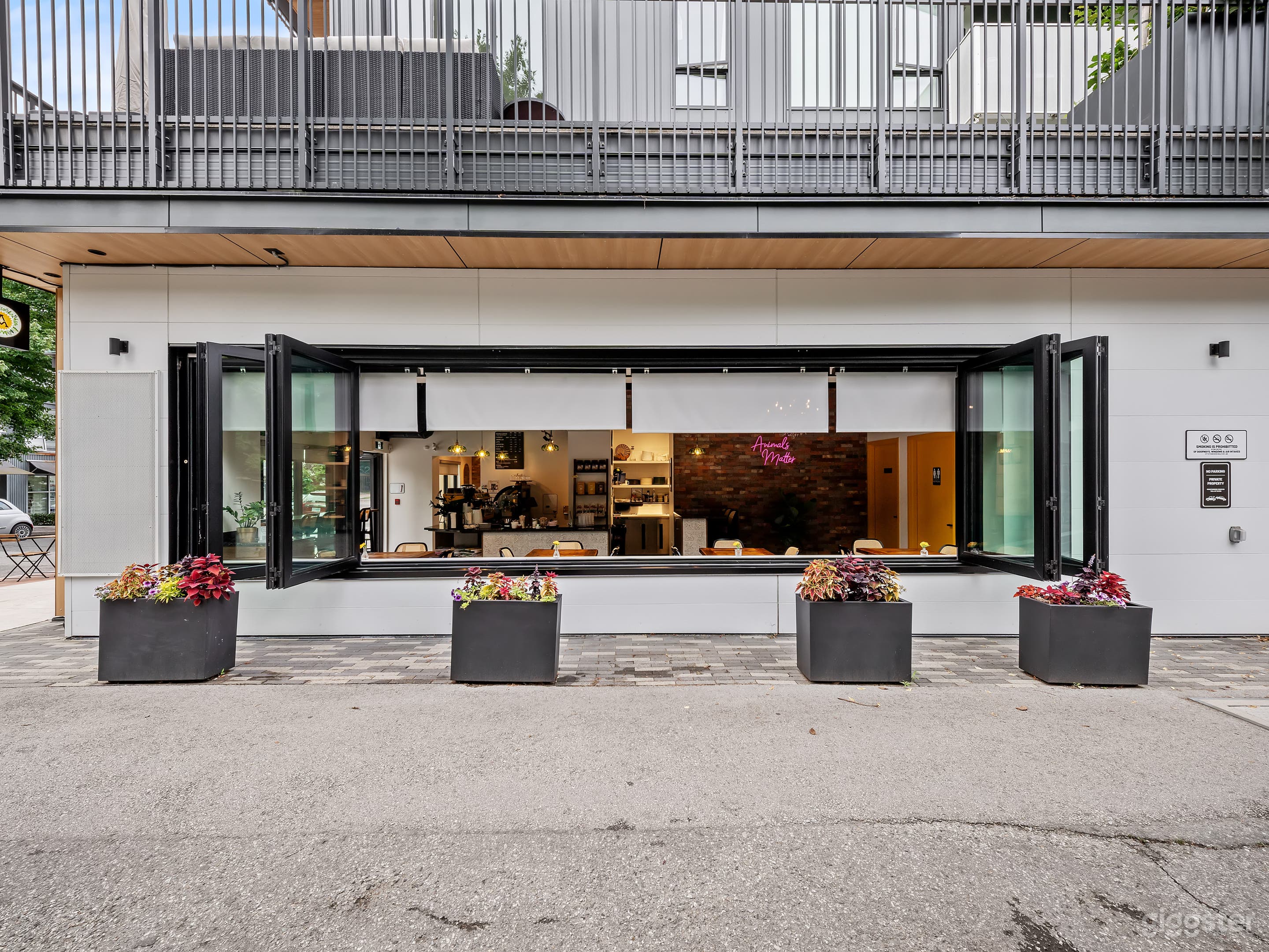 Modern Corner Café with Exposed Brick & Patio Photo 3