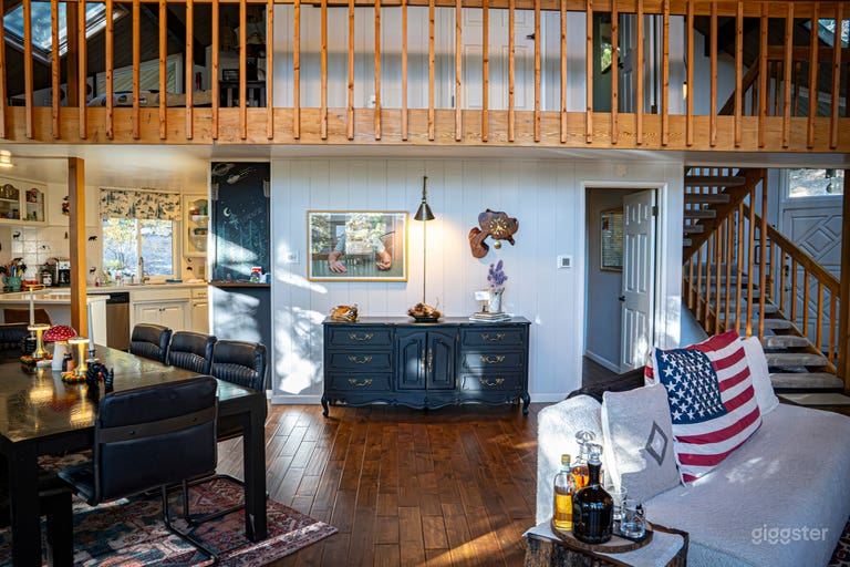  In between the kitchen and living area 