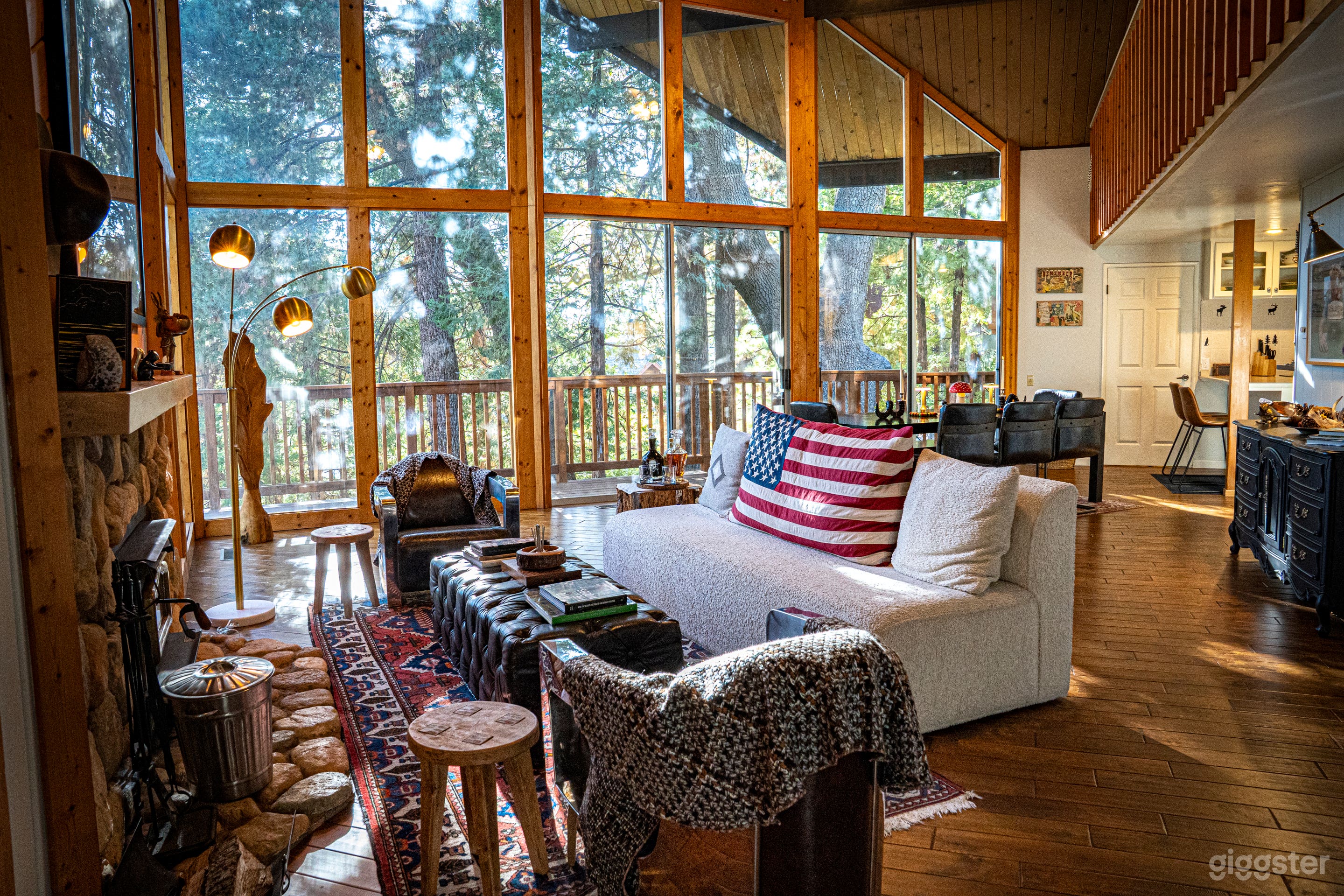 Living room with 3 stories of windows