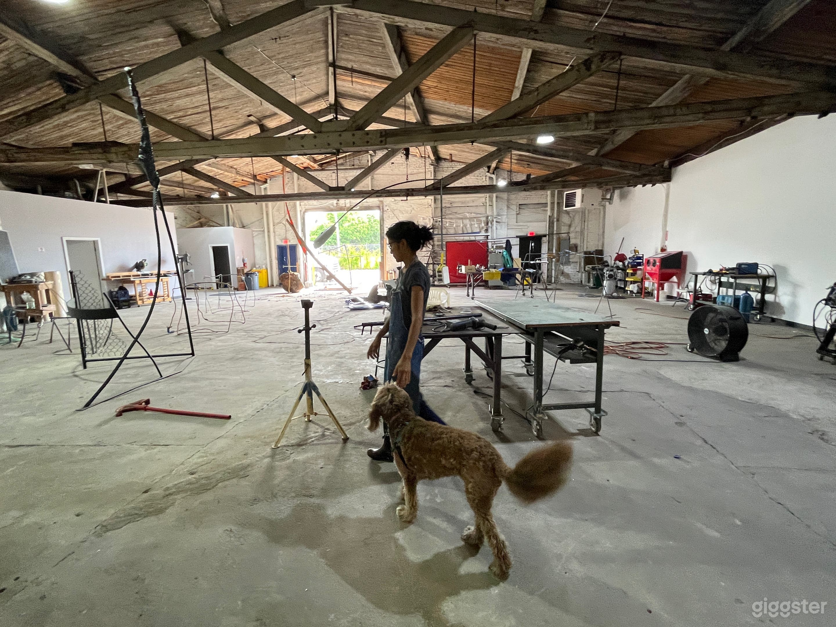 Artist studio with welding equipment. Can be stored and come clean.