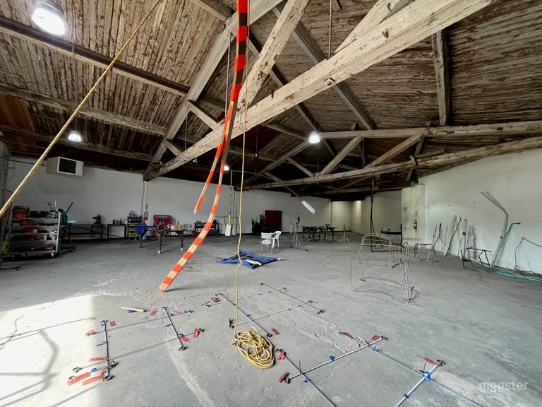  View from the front. On the right is a bathroom with wheelchair access, shower, a large stainless steel slop sink. 