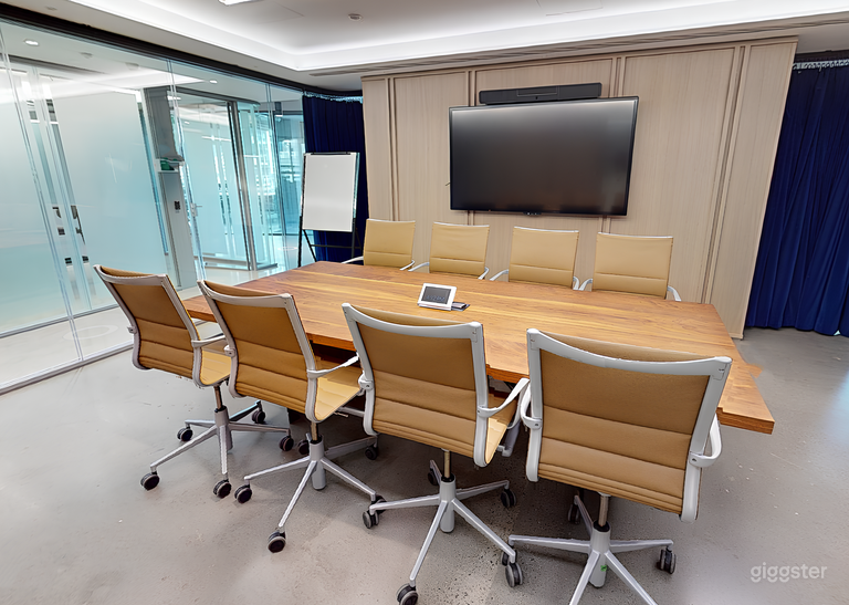  Integrated A/V system including a camera for remote participants. 