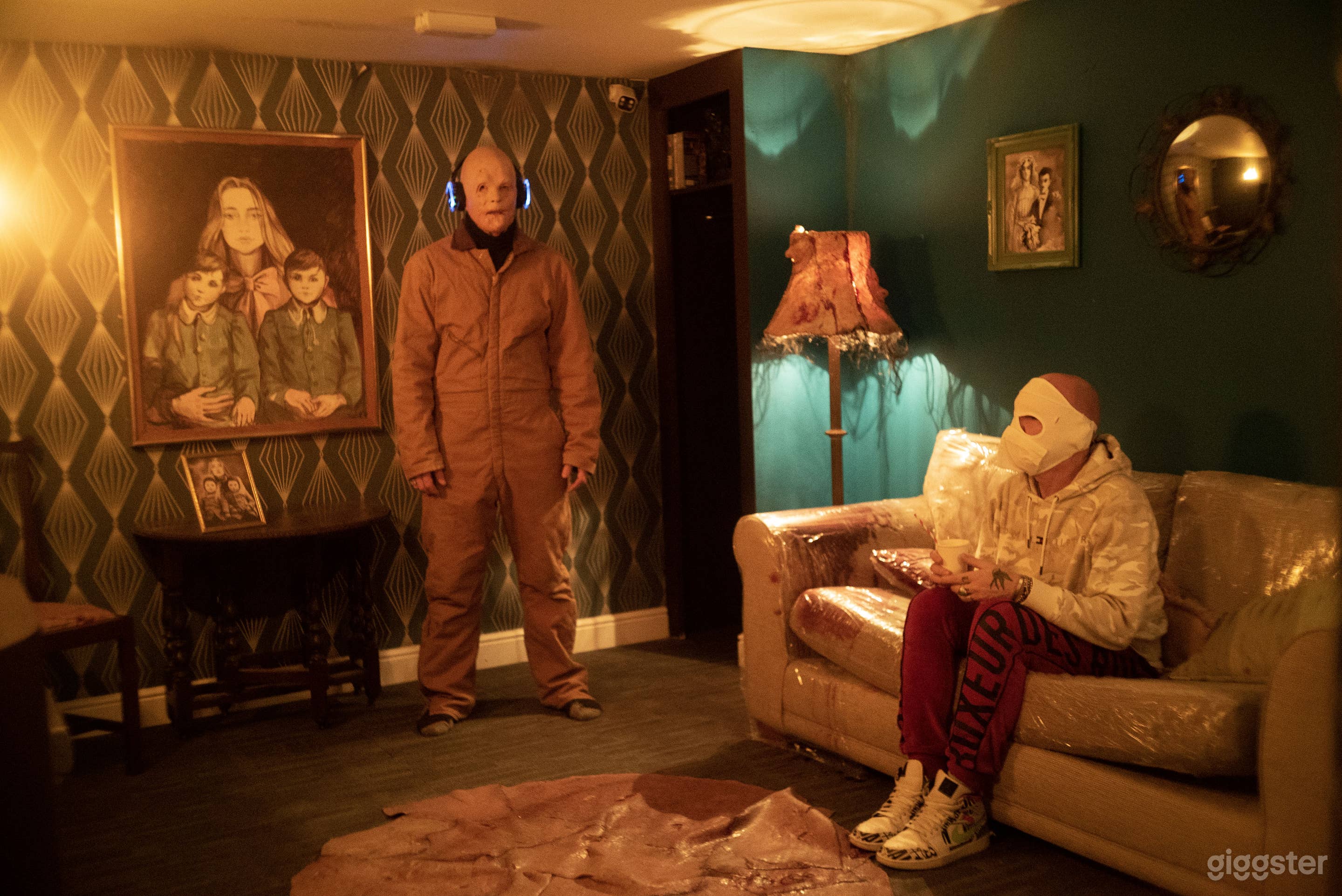 This is the living room. Decorated with Ed Gein inspired home furnishings and a blood-stained sofa. 