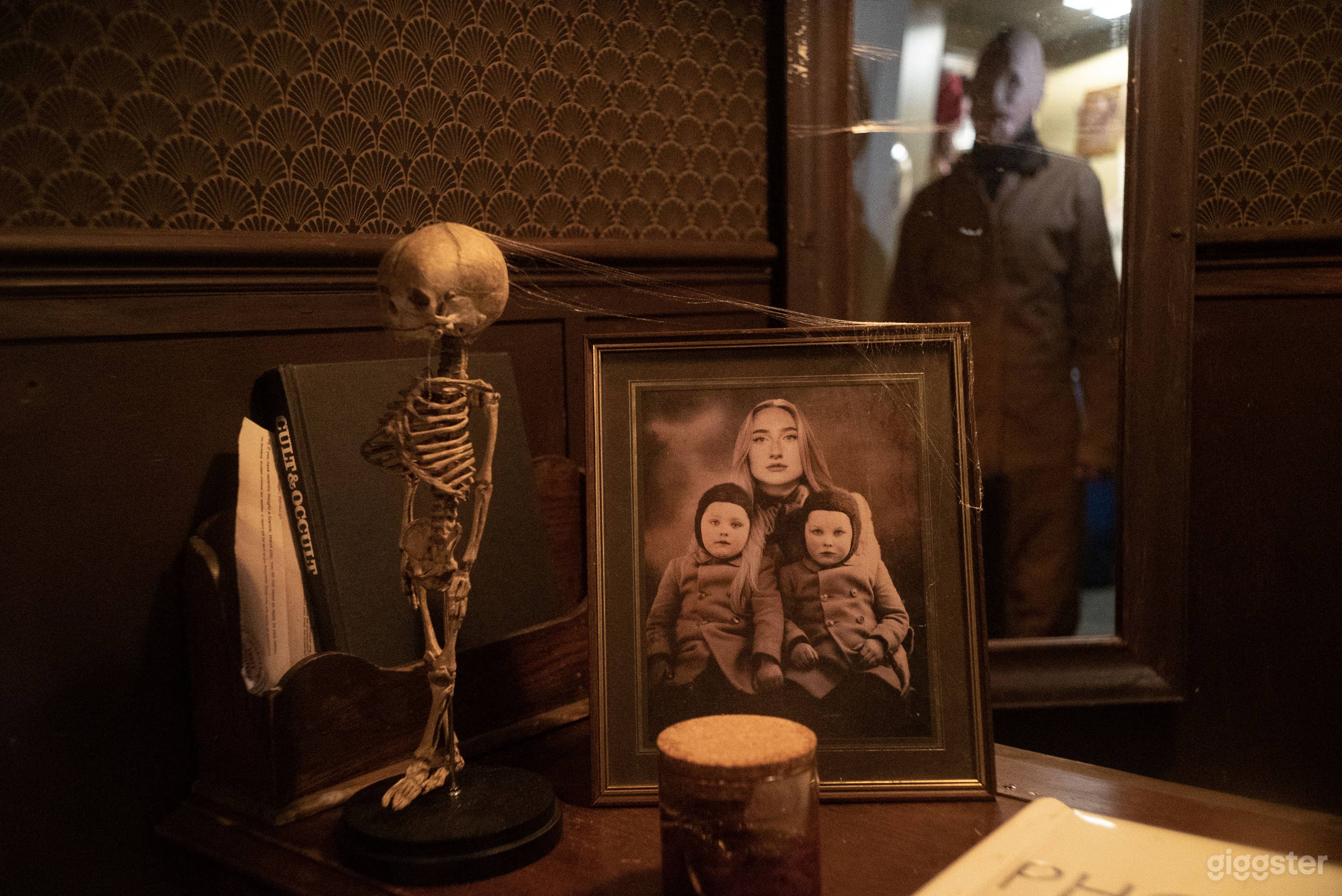 This is an old abandoned tailors shop. It is now used by our serial killer character to sew human skin together as part of his Great Work.