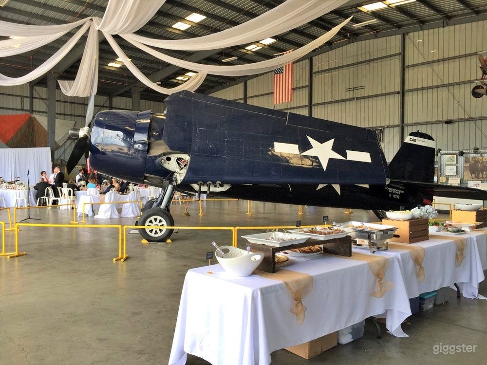 Versatile Hangar Space with Planes Photo 4