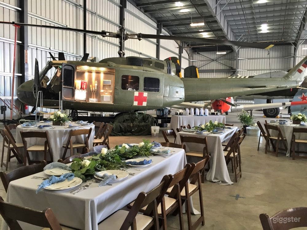 Versatile Hangar Space with Planes Photo 3