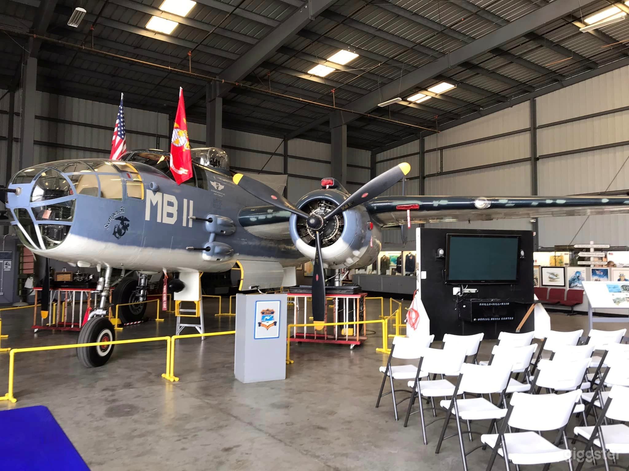 Versatile Hangar Space with Planes Photo 2