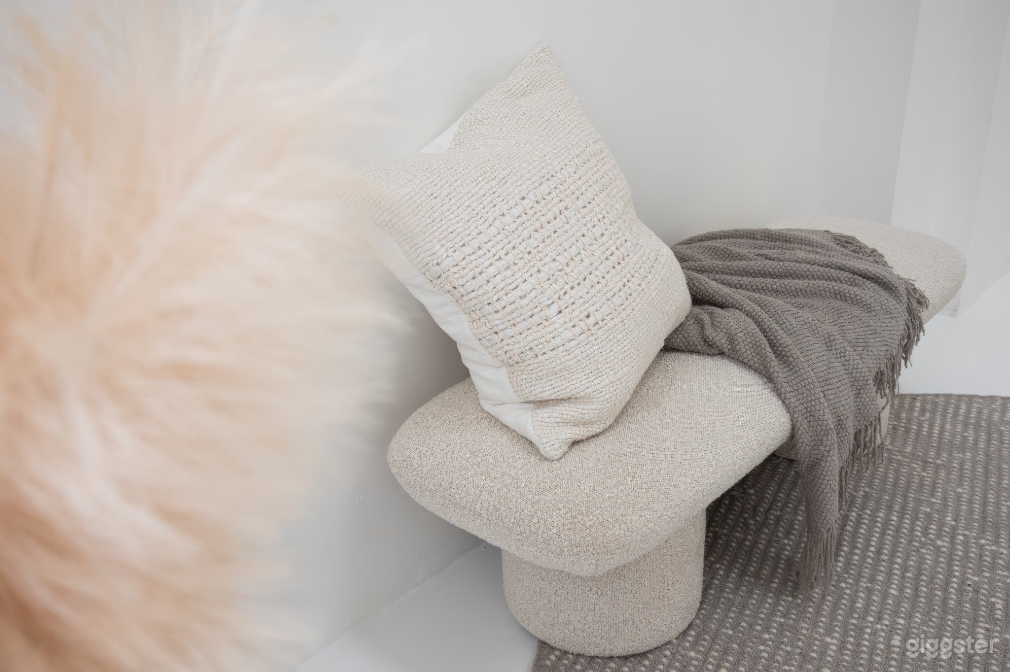 Chic boho-inspired bench adds character to our bright white and airy Captivating boho-inspired display adds flair and character to any space, perfect for infusing warmth, enhancing your creative shoots with style and comfort.