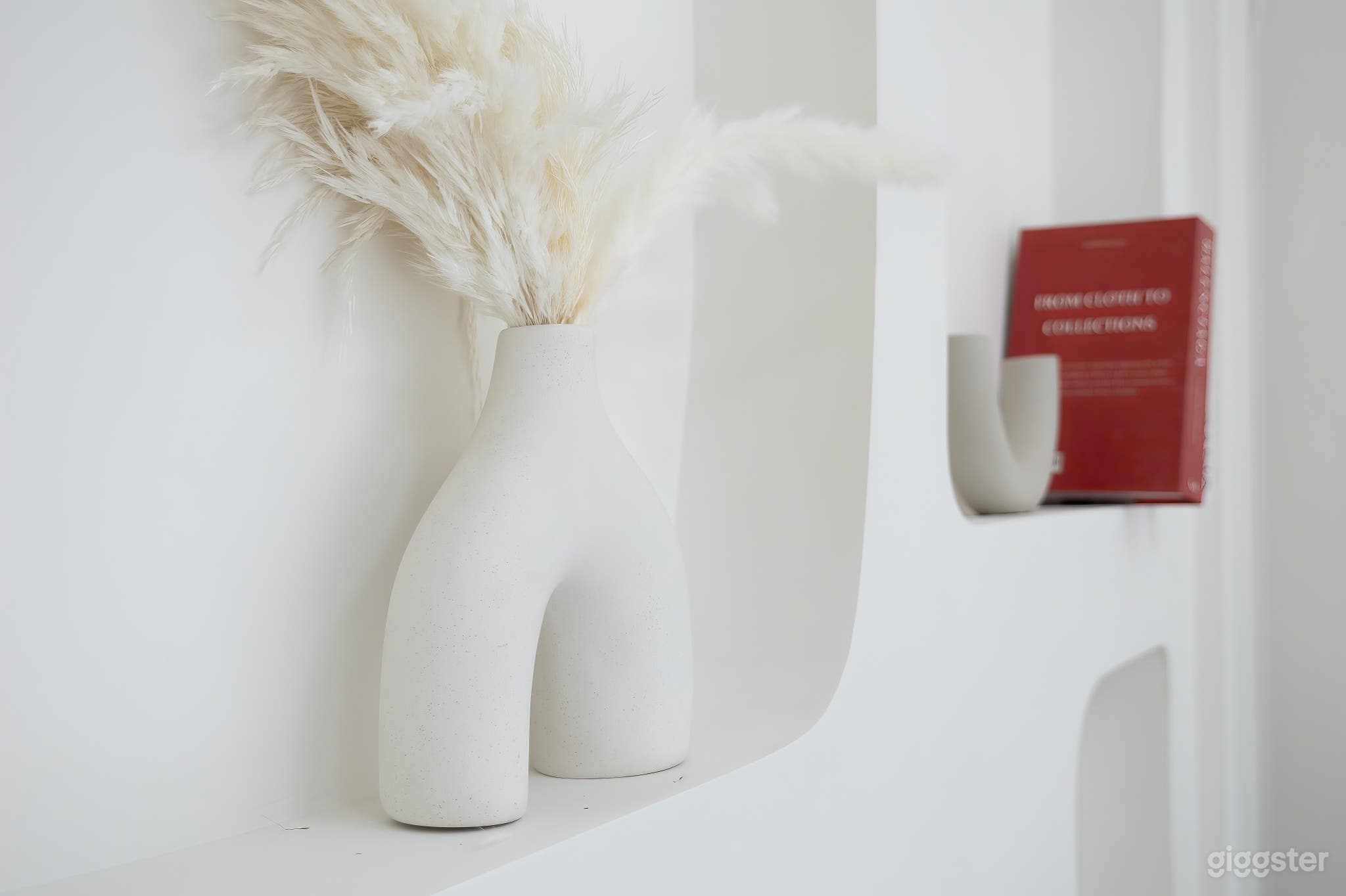 Captivating boho-inspired display adds flair and character to the space, perfect for infusing warmth and creativity into your photographs.