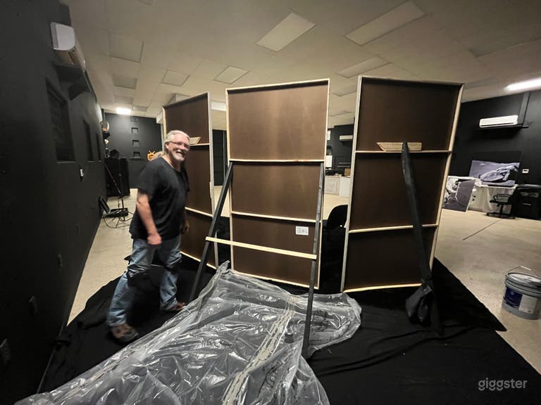  Our production assistant, James, setting up flats.  