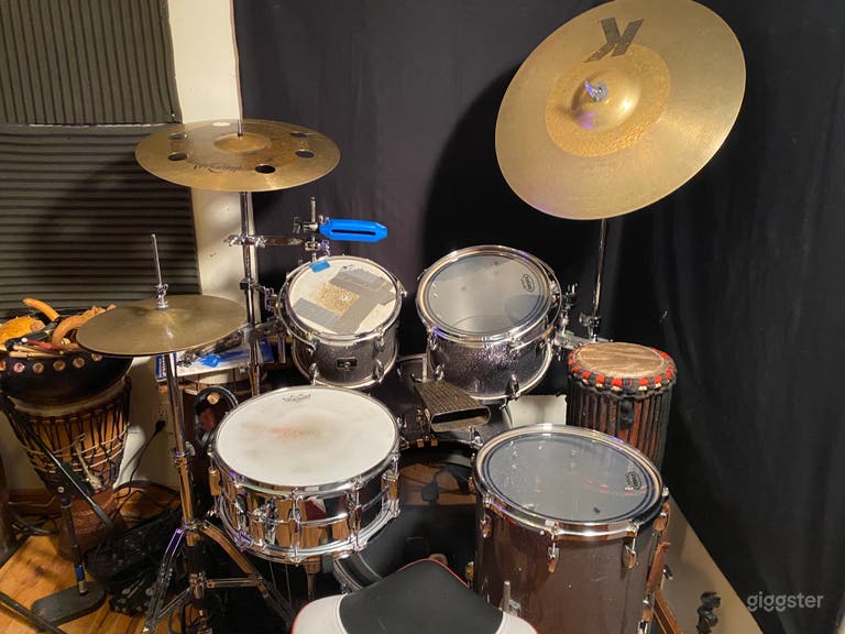  Gretsch and Ludwig Drums, and and assortment of percussion instruments. 