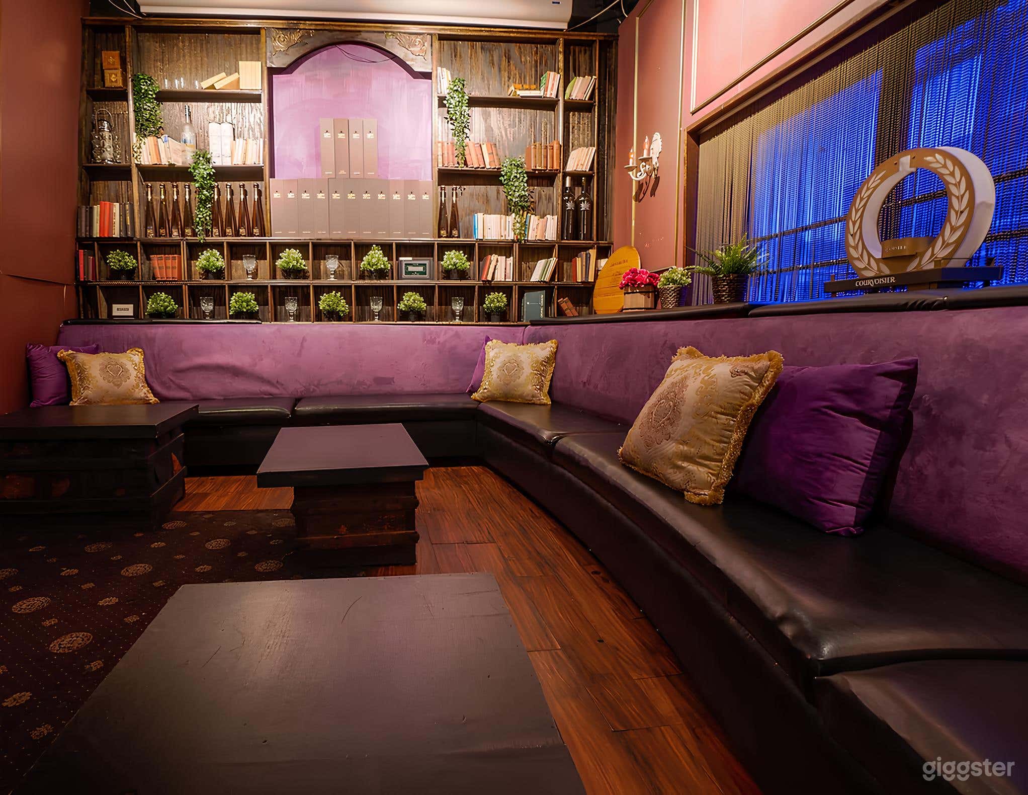 Library Lounge – A Cozy, Purple-Hued Escape Photo 1