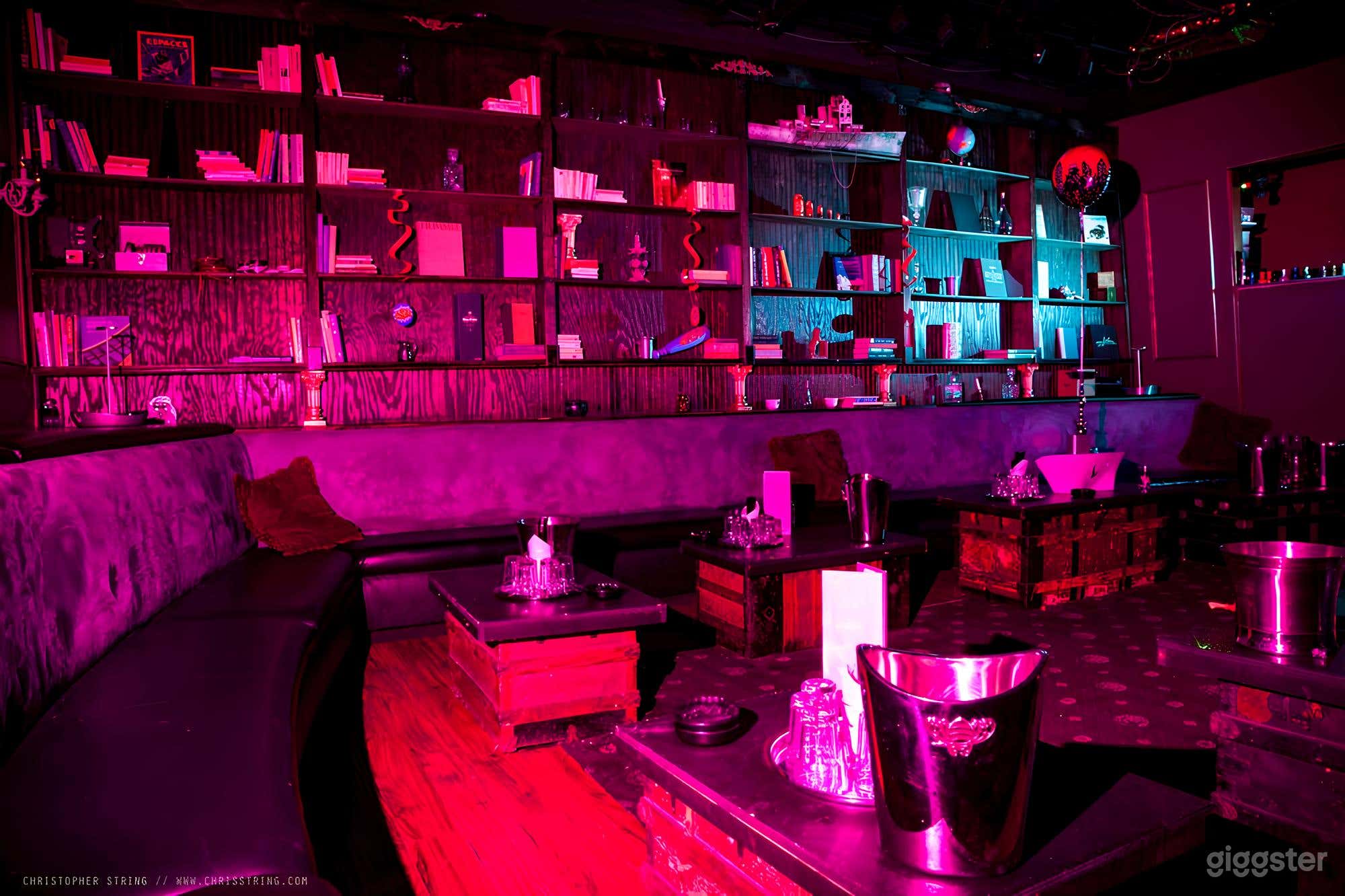 Library Lounge – A Cozy, Purple-Hued Escape Photo 2