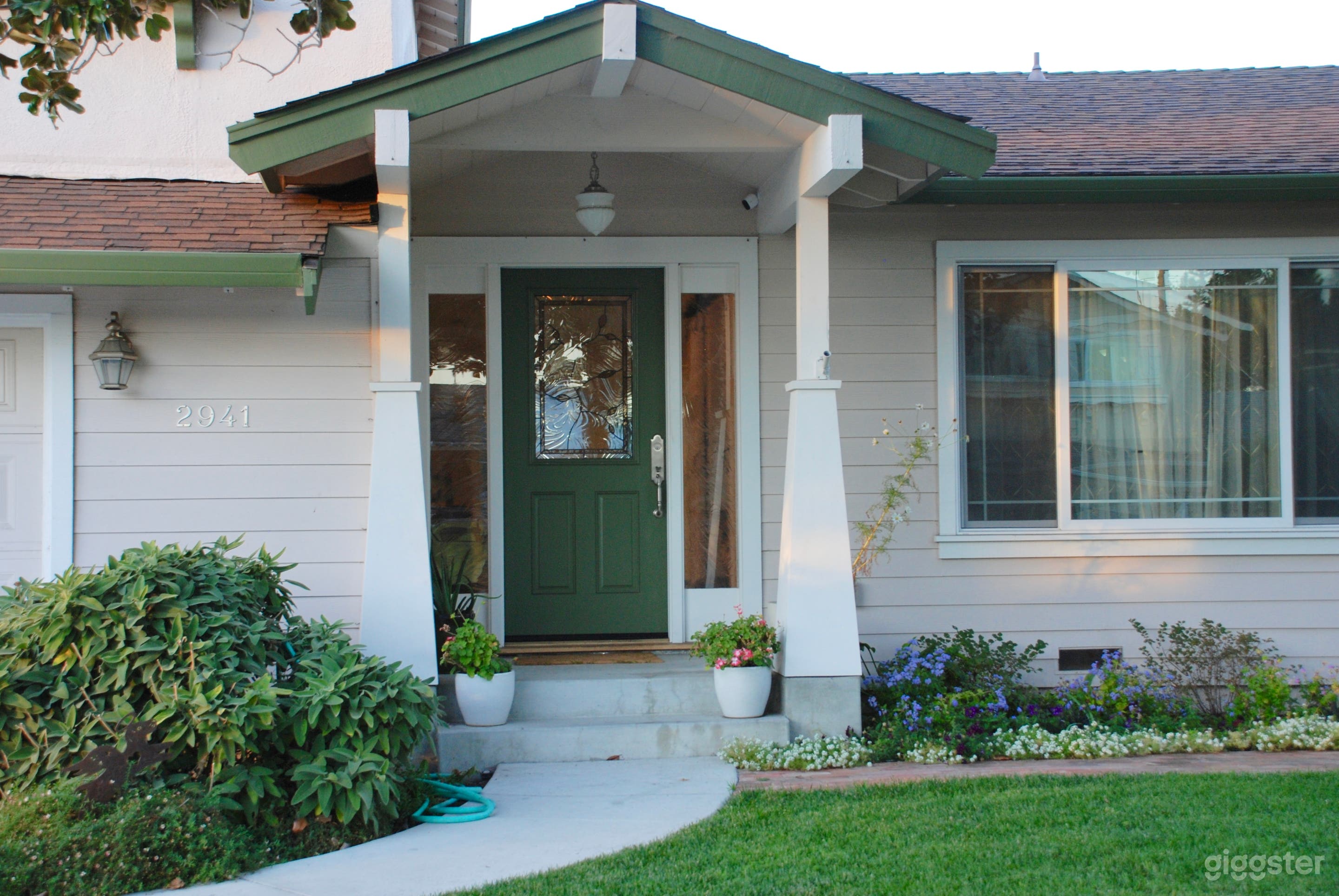 The front porch has Craftsman-style columns. 