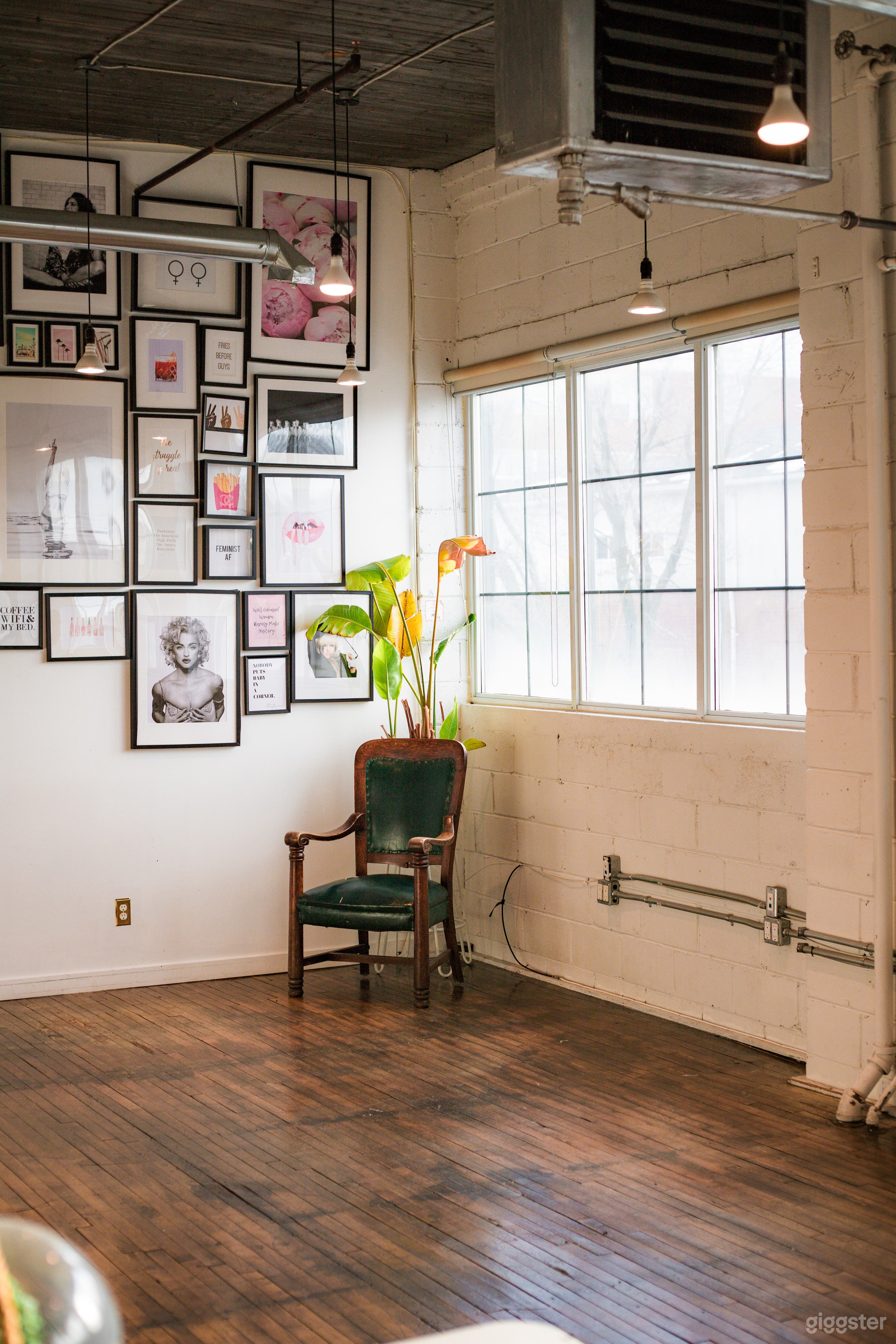 Natural light loft, exposed brick, industrial look, sunlight photography studio, golden hour 