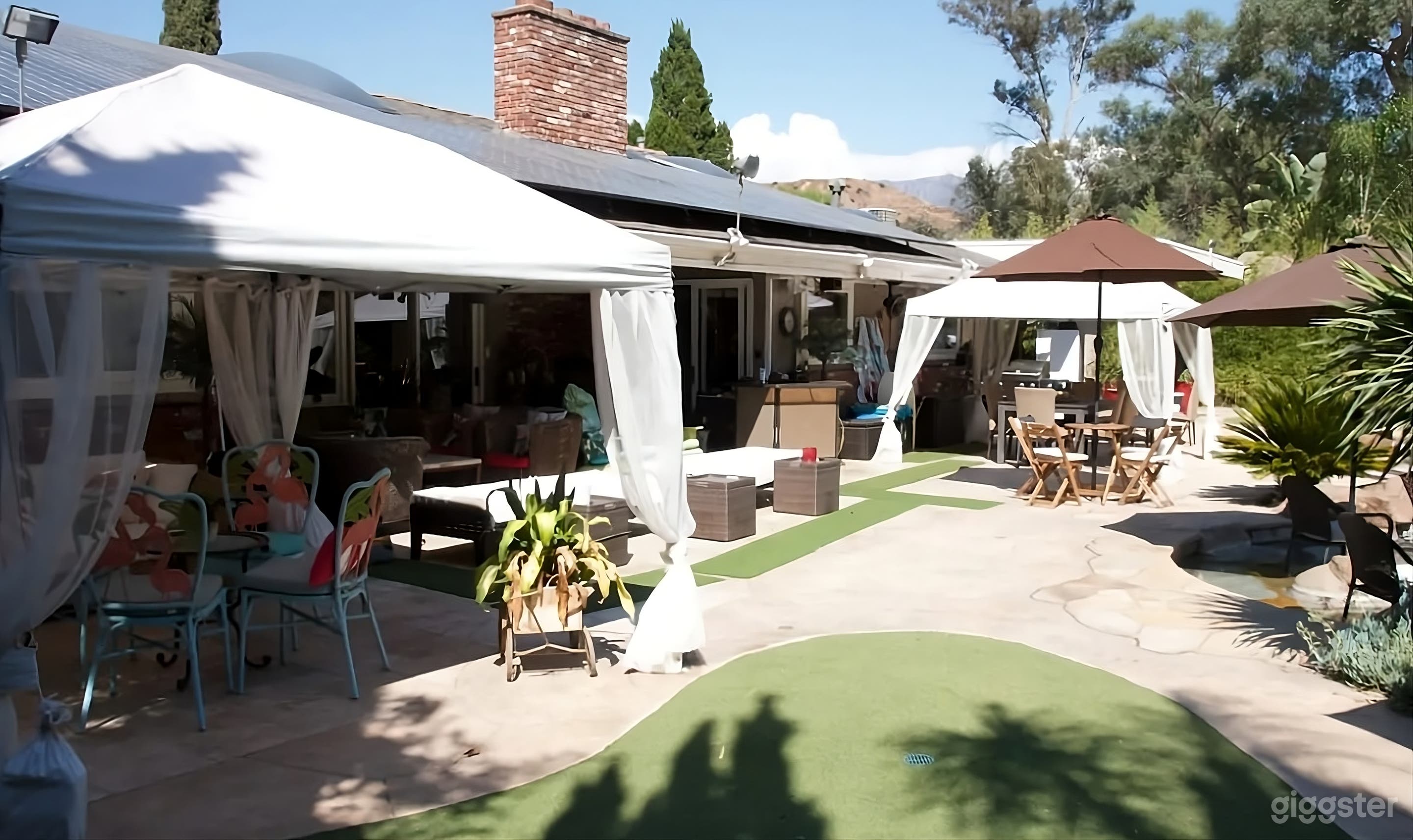 Stunning Resort Style Backyard with Pool Photo 4