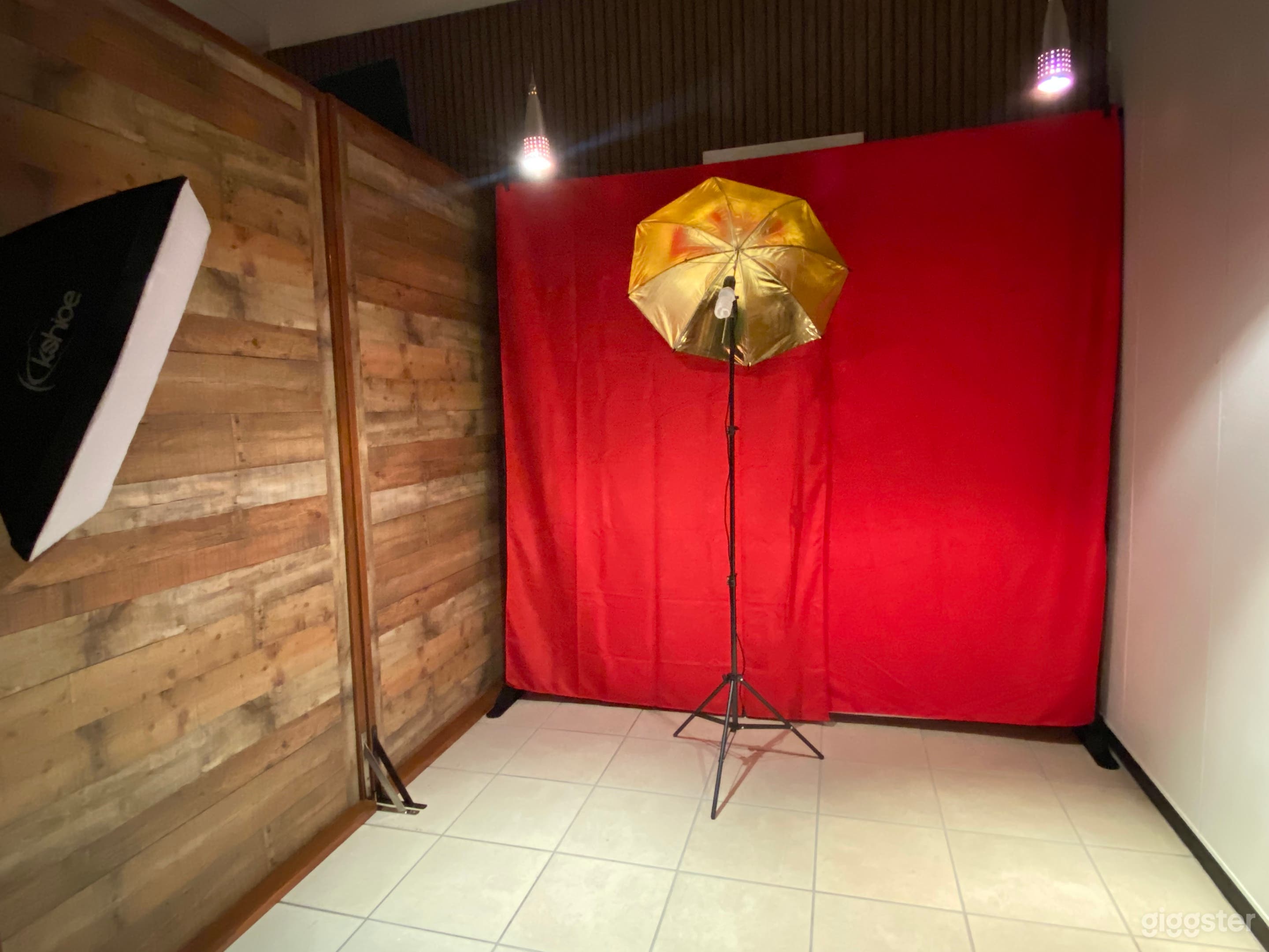 "Step onto the red carpet with our sleek red backdrop, perfect for exclusive interviews."