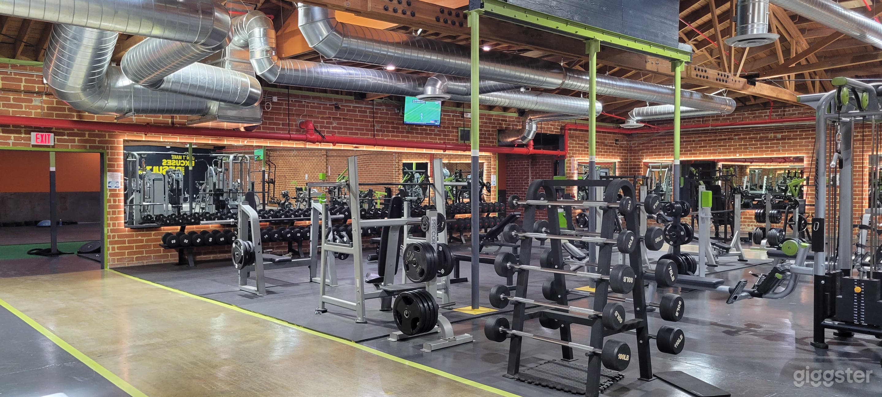 Beautiful Brick Walled Main Gym Area Photo 3