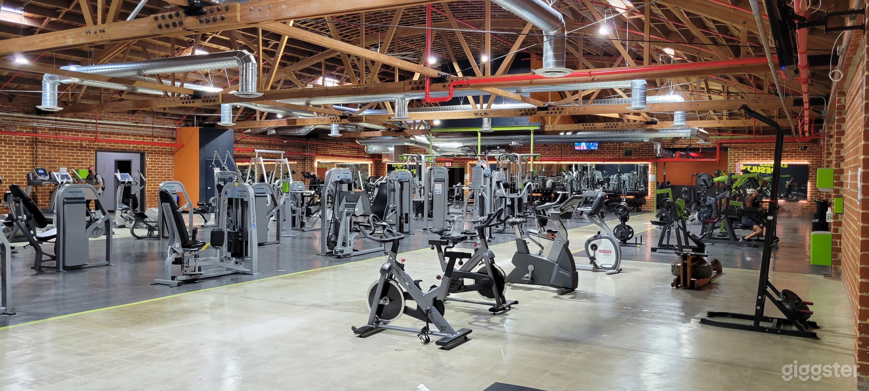 Beautiful Brick Walled Main Gym Area Photo 4