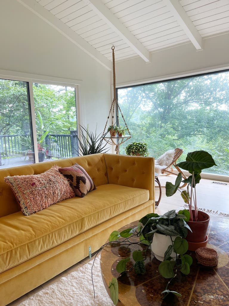  Living room floor to ceiling window and sliding glass door view. Full view of nature preserve and river. 