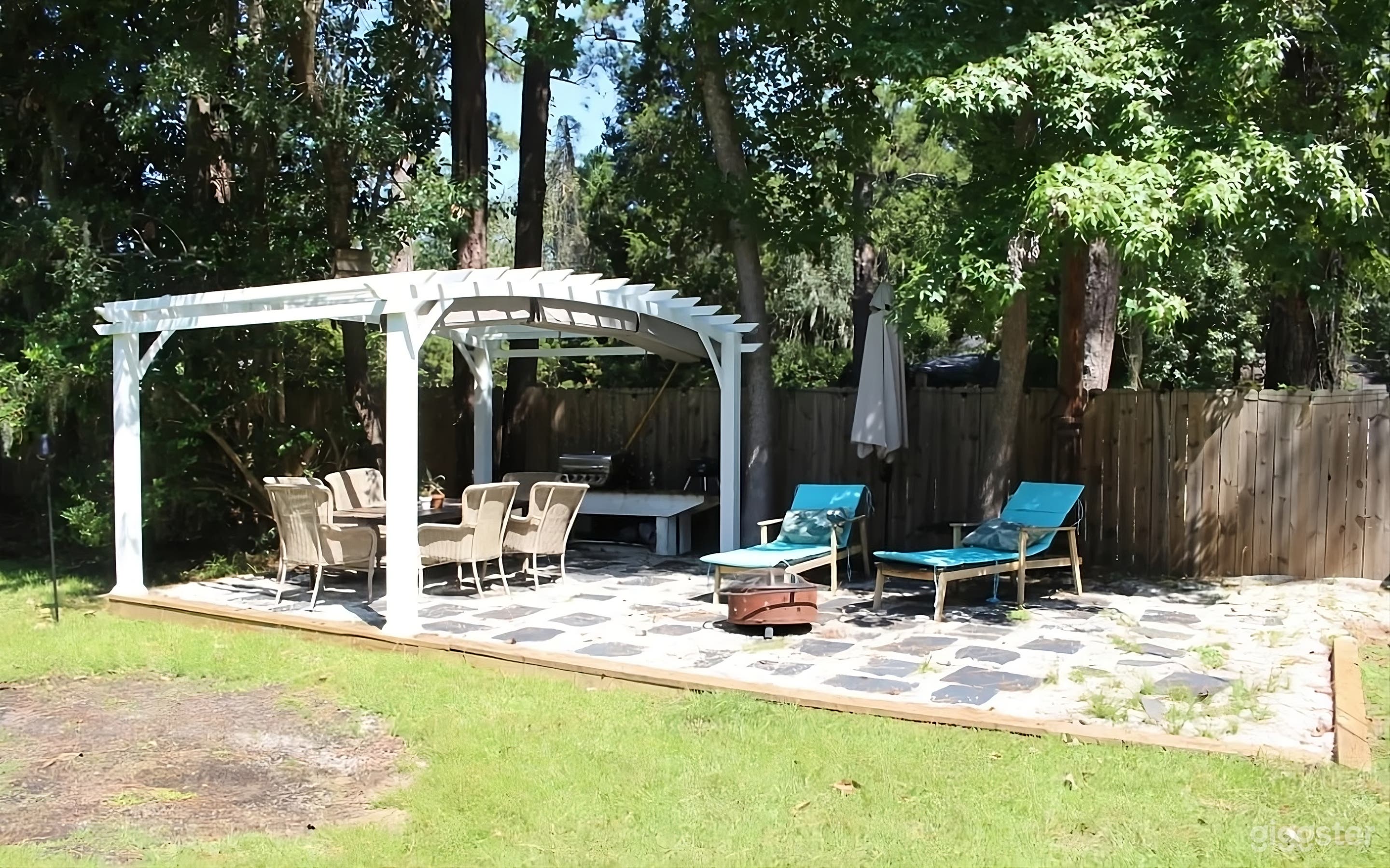 Expansive Wooded Backyard Retreat Photo 4
