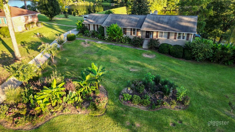  Aerial Scene front view long driveway,,food truck,parking on grass allowed

 
