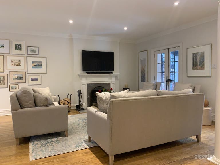  Open concept livingroom with walkout french doors to front porch 